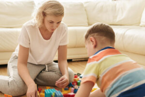 Mother and son playing with legos